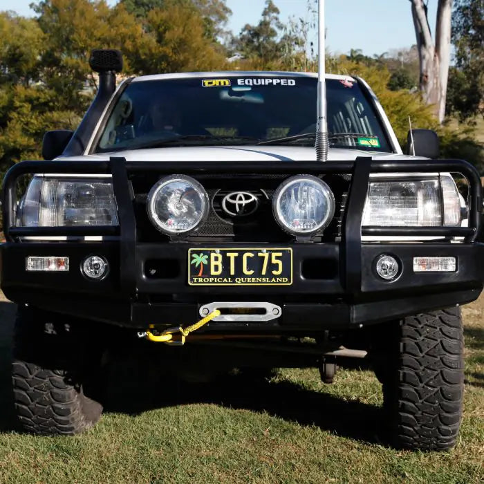 TJM OUTBACK BULL BAR BLACK STEEL FOR TOYOTA LANDCRUISER WAGON 105 SERIES COIL (IN STORE PICK-UP ONLY)
