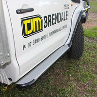 TJM SIDE BARS & STEPS STEEL SAT BLACK 50MM FOR TOYOTA HILUX 7TH GEN 04/05-07/11 (IN STORE PICK-UP ONLY)